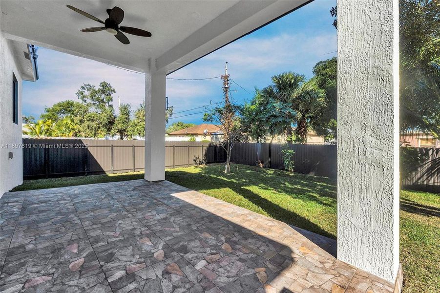 Exterior details and patio area of a home in , North Miami (Image 3).