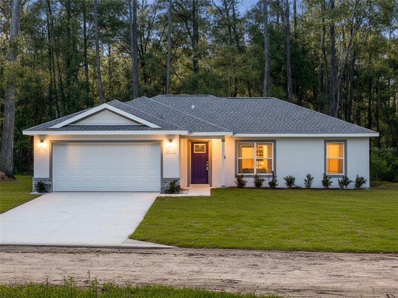 Front exterior of a new home in , Dunnellon, FL, highlighting curb appeal (Image 24).