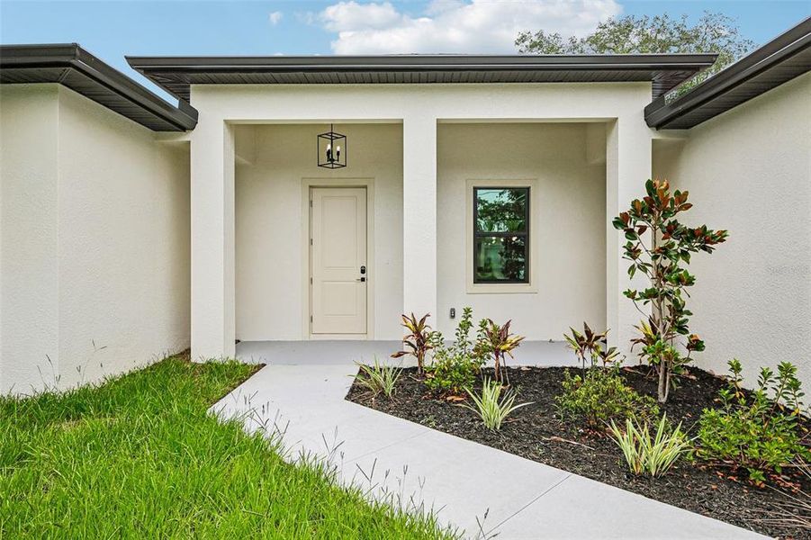 Exterior details and patio area of a home in , North Port (Image 26).