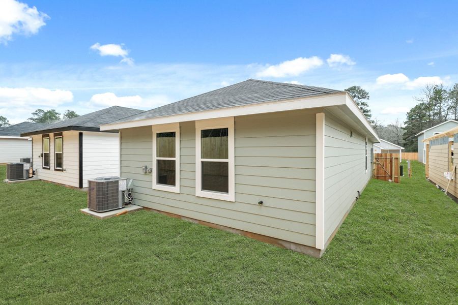 Exterior details and patio area of a home in William Trails, Willis (Image 4).