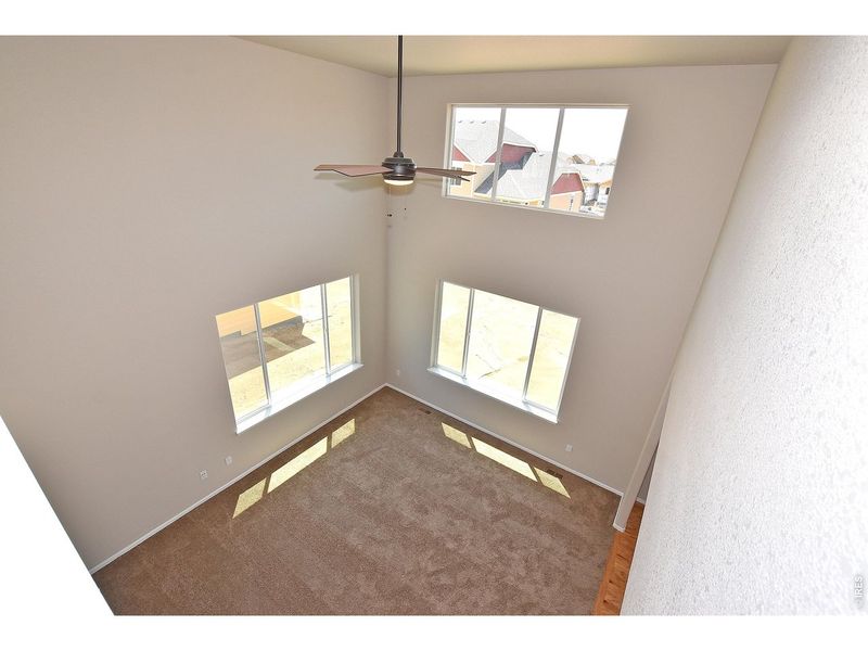 Spacious, unfurnished interior of a new home in Union Colony West, Greeley (Image 21).