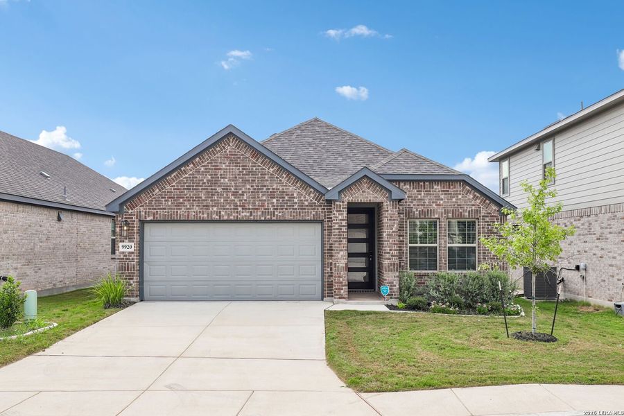 Front exterior of a new home in Kallison Ranch, San Antonio, TX, highlighting curb appeal (Image 25).