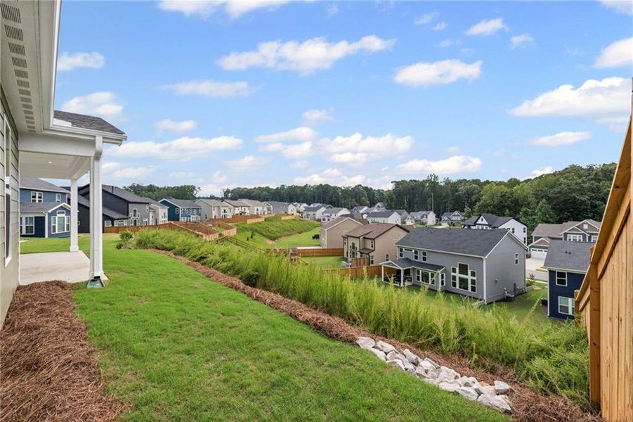 Front exterior of a new home in The Reserve At Liberty Park, Braselton, GA, highlighting curb appeal (Image 22). Front exterior of a new home in The Reserve At Liberty Park, Braselton, GA, highlighting curb appeal (Image 22).