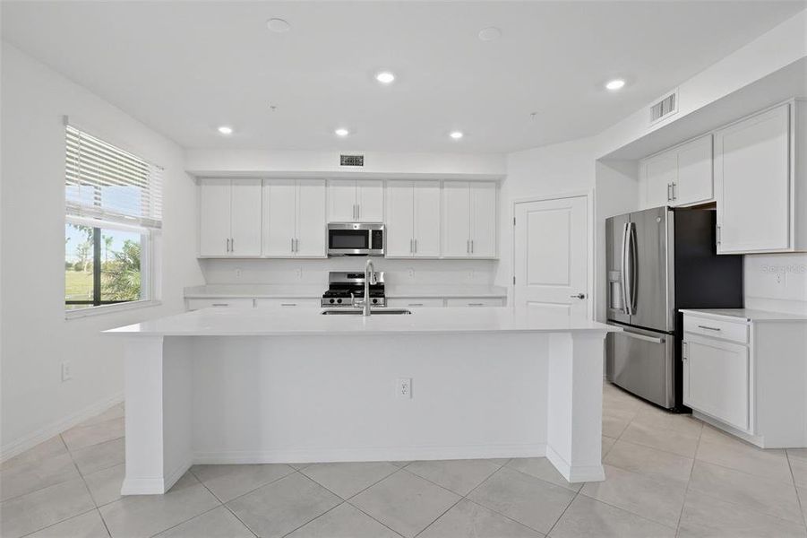 Furnished interior view inside a new home in Calusa Country Club, Lakewood Ranch (Image 6).