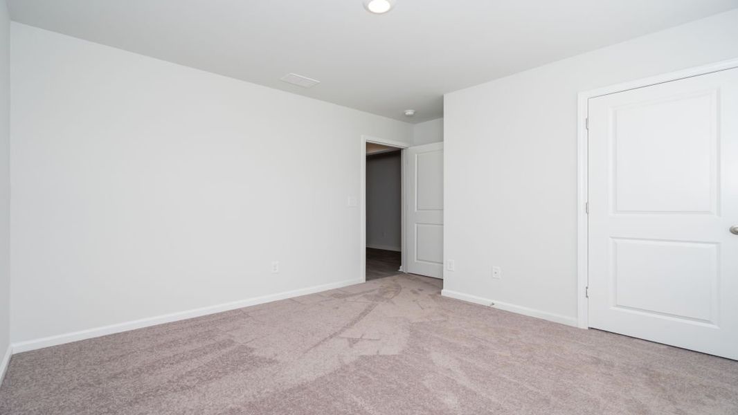 Representative unfurnished interior of a home built from the Cali by D.R. Horton in Jordanville Farms, Galivants Ferry (Image 15).