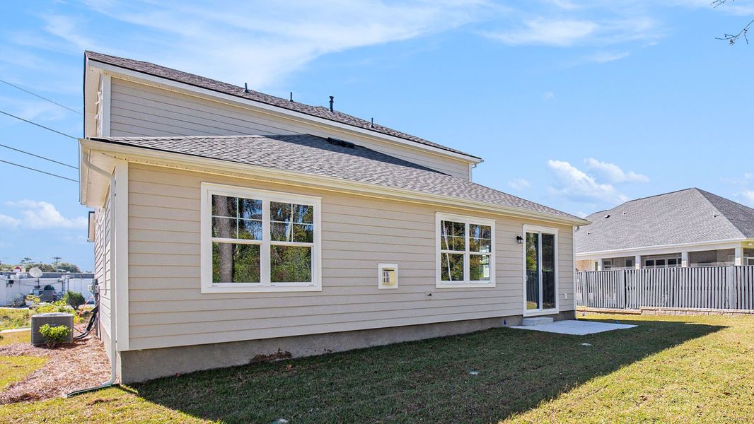 Exterior details and patio area of a home in Belle Park, North Myrtle Beach (Image 4).