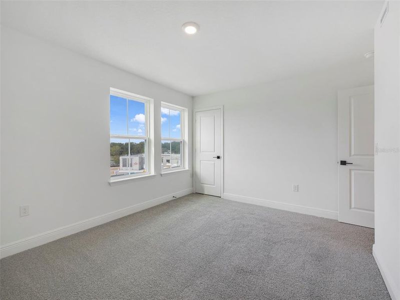 Spacious, unfurnished interior of a new home in Vintner Reserve, Clermont (Image 19). Spacious, unfurnished interior of a new home in Vintner Reserve, Clermont (Image 19).