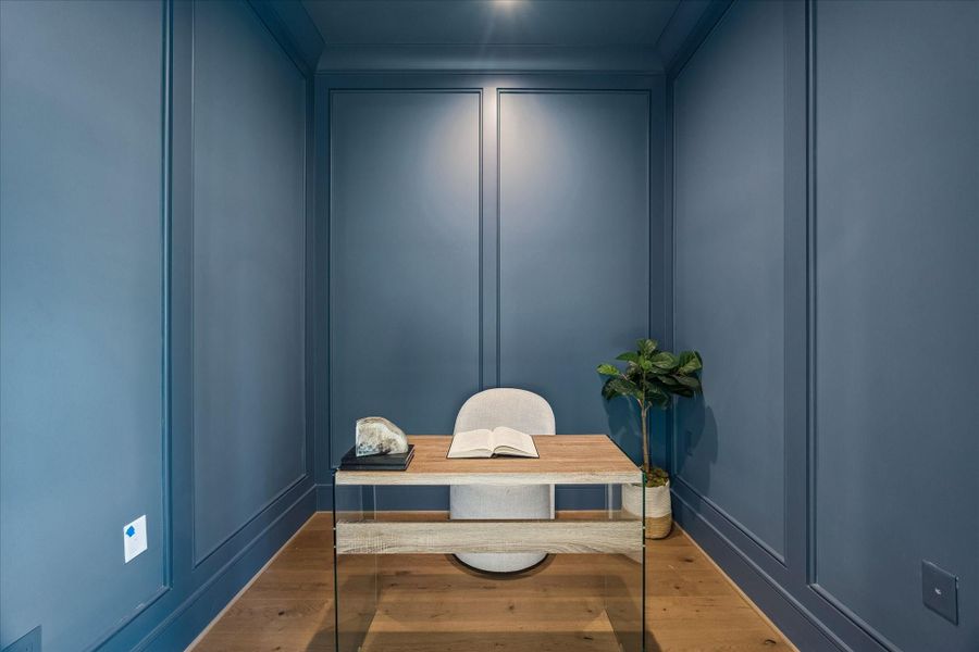 Also behind the kitchen is a great secret--this paneled home office! Work form home, keep track of recipes and budgets, or hide away with comfy chairs and a cocktail.