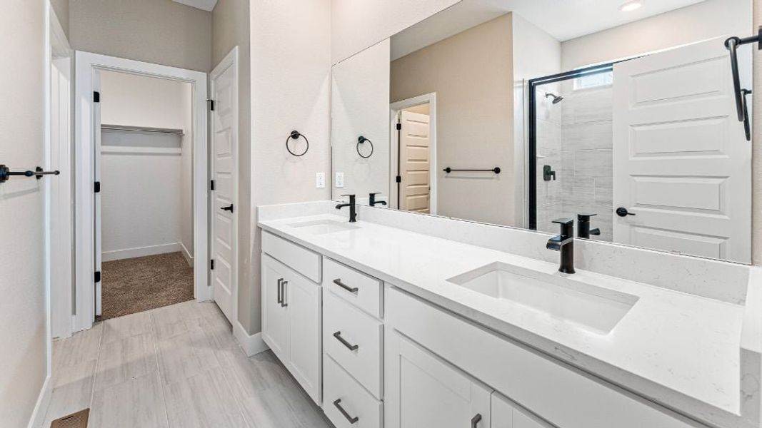Representative furnished interior of a home built from the Pike by Taylor Morrison in The Aurora Highlands Town Collection, Aurora (Image 28).