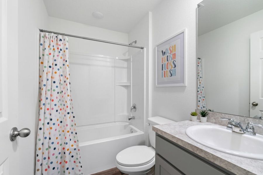 Representative furnished interior of a home built from the Alexander by Holiday Builders in Poinciana, Poinciana (Image 9).