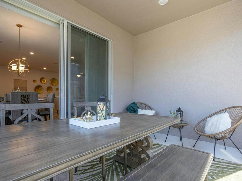 Your living space extends outdoors to a covered lanai - Shelby II by Highland Homes