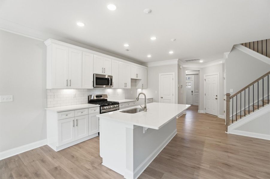 Furnished interior view inside a new home in Harrisburg Village Townhomes, Harrisburg (Image 9).