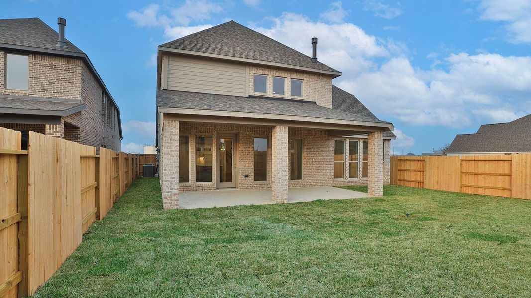 Exterior details and patio area of a home in The Grand Prairie, Hockley (Image 3).