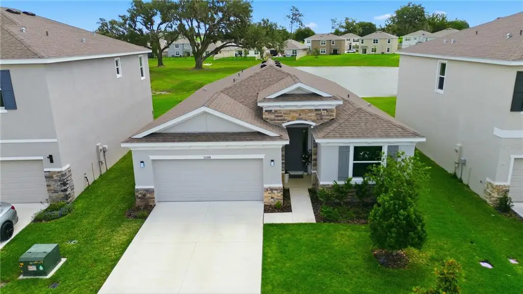 Front exterior of a new home in , San Antonio, FL, highlighting curb appeal (Image 21).