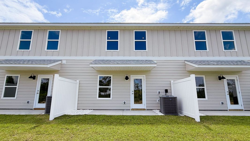 Exterior details and patio area of a home in WindMark Beach, Port Saint Joe (Image 3).