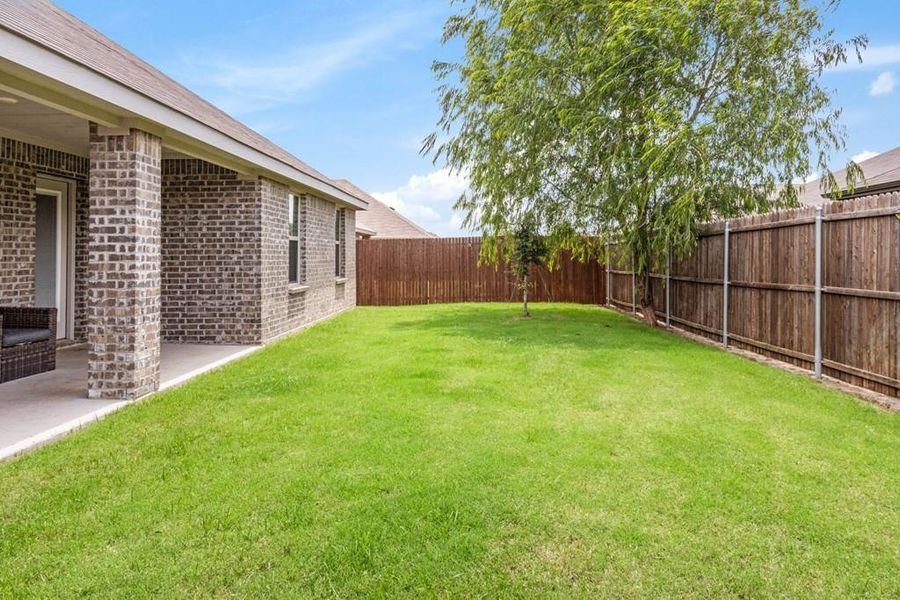 Front exterior of a new home in , Caddo Mills, TX, highlighting curb appeal (Image 20). Front exterior of a new home in , Caddo Mills, TX, highlighting curb appeal (Image 20).