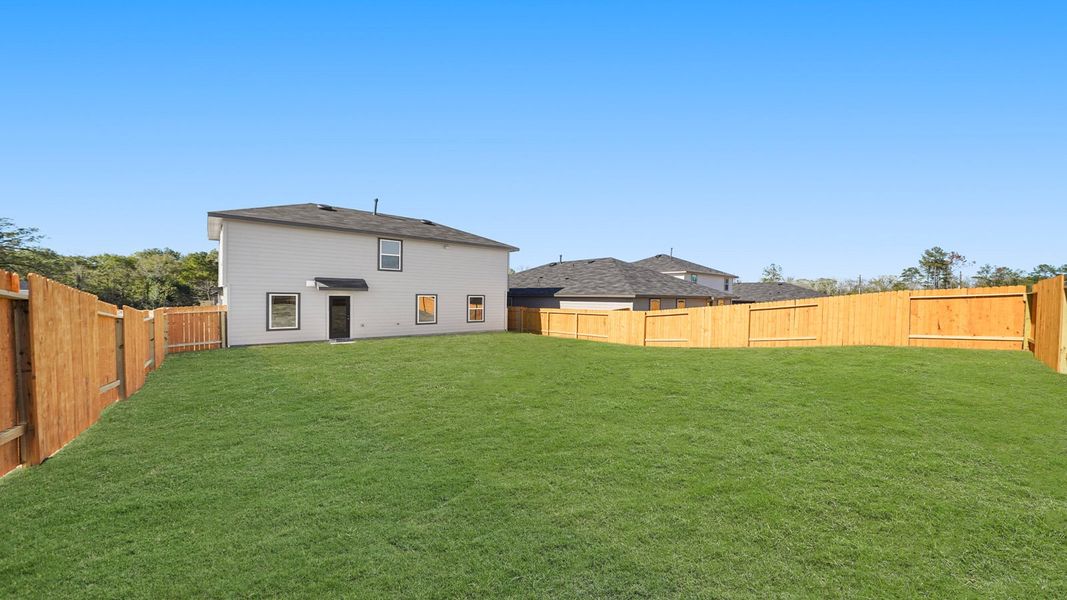 Exterior details and patio area of a home in Westward Pointe, Sealy (Image 4).
