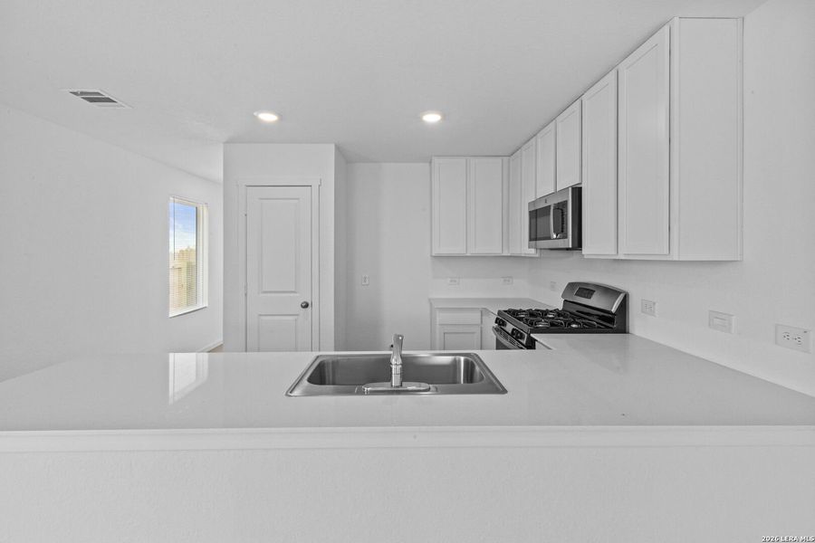 Furnished interior view inside a new home in Spring Grove, St. Hedwig (Image 8).