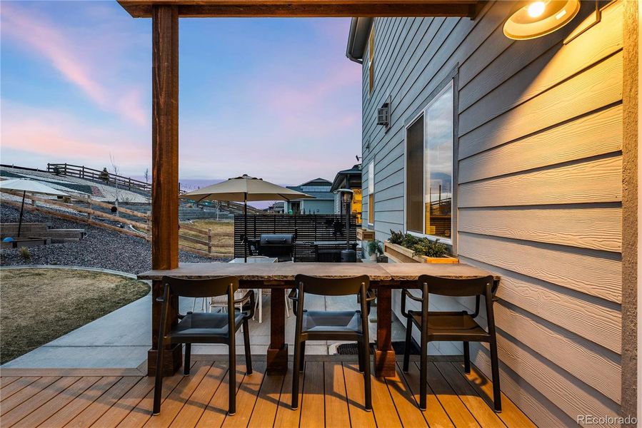 Exterior details and patio area of a home in Poudre Heights: The Alpine Collection, Windsor (Image 24).