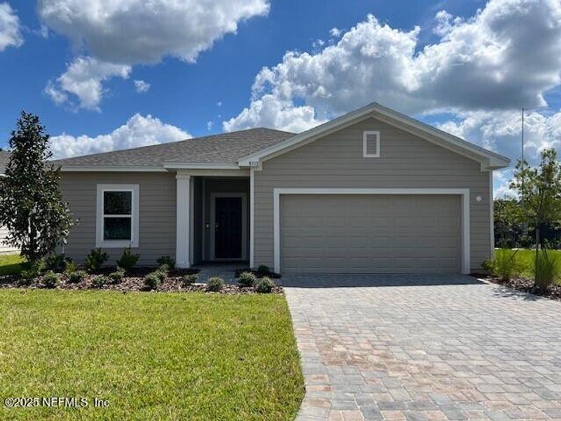 Front exterior of a new home in Coopers Meadow, Jacksonville, FL, highlighting curb appeal (Image 2).
