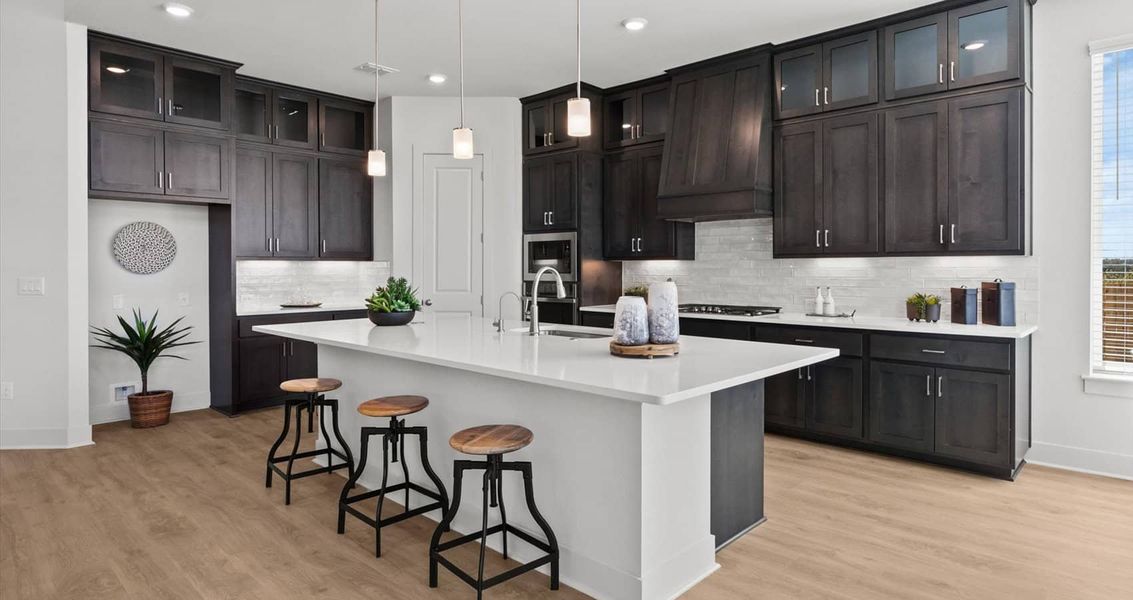 Representative furnished interior of a home built from the Waterloo by Chesmar Homes in Sunfield, Buda (Image 11).