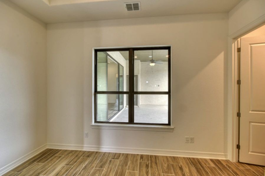 Spacious, unfurnished interior of a new home in El Sonido at Campanas, San Antonio (Image 31).