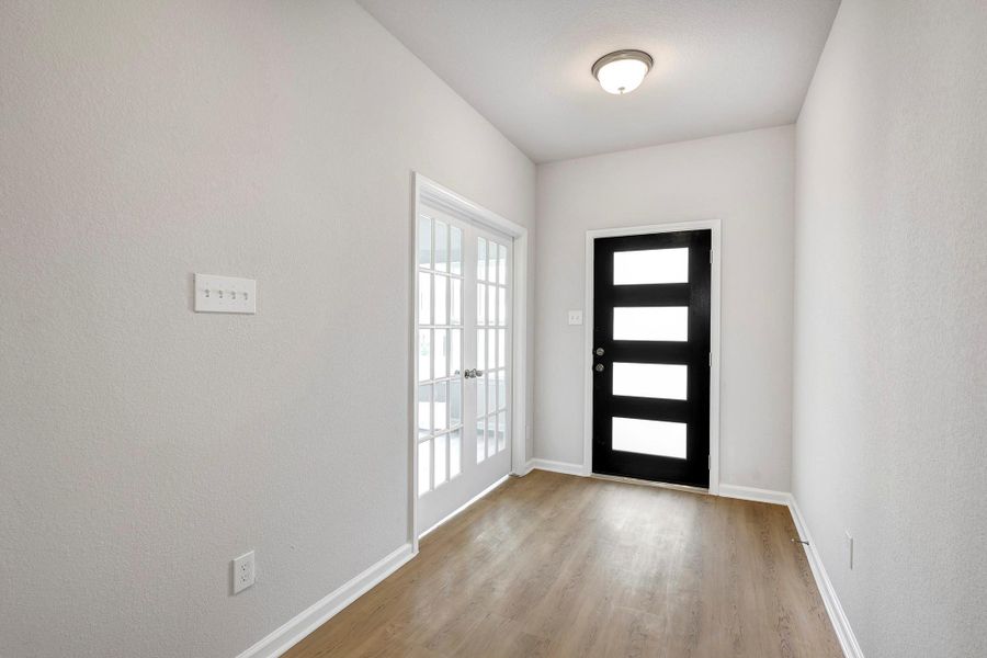 The Davenport II- Foyer and Study with French Doors. Sample floor plan photo used for illustrative purposes only. Upgrades, selections options, and colors will vary. The Davenport II- Foyer and Study with French Doors. Sample floor plan photo used for illustrative purposes only. Upgrades, selections options, and colors will vary.