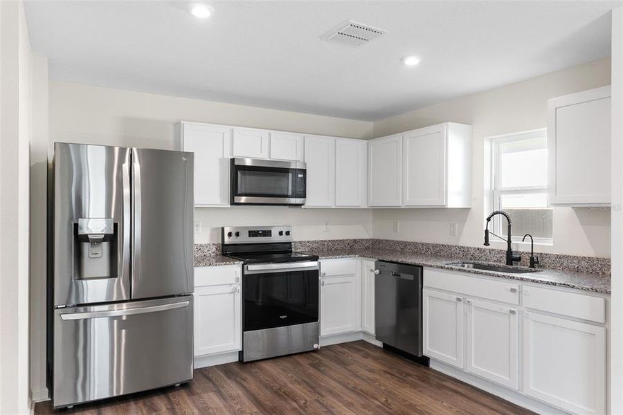 Furnished interior view inside a new home in Sumter Villas, Sumterville (Image 8).