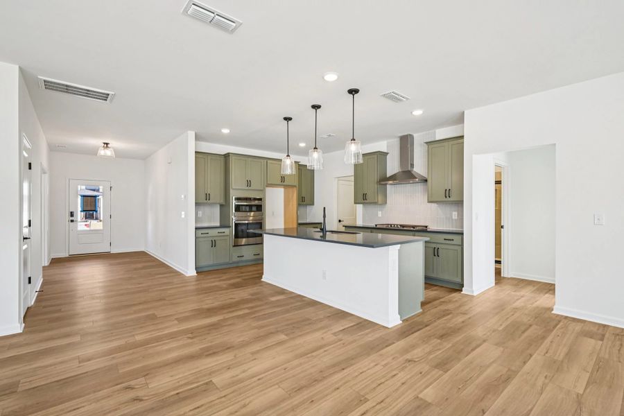 Kitchen featuring the AW Collection® Rosemary - Matte black, light wood, and garden-inspired style