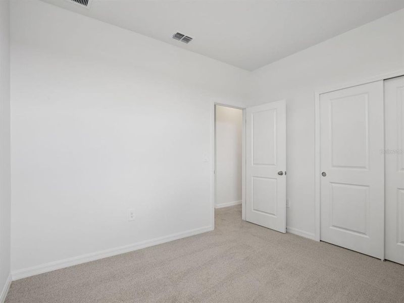 Spacious, unfurnished interior of a new home in Coasterra - Reserve Series, Palmetto (Image 45).