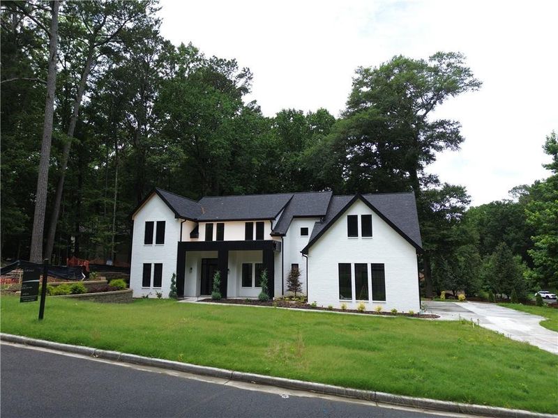 Front exterior of a new home in , Alpharetta, GA, highlighting curb appeal (Image 32).