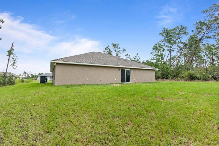 Exterior details and patio area of a home in Marion Oaks, Ocala (Image 11).