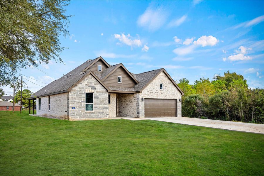 Front exterior of a new home in , Prairie View, TX, highlighting curb appeal (Image 1).