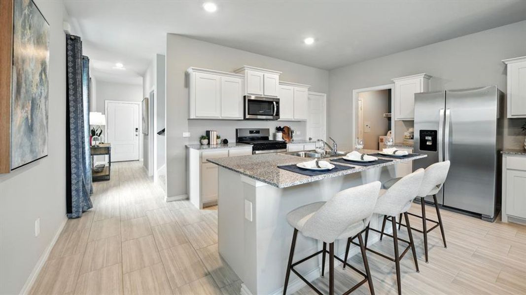 Furnished interior view inside a new home in Monarch at the Meadows, Ponder (Image 8).