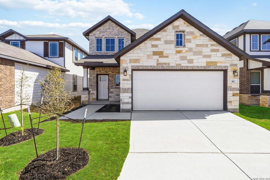 Front exterior of a new home in Red Hawk Landing, San Antonio, TX, highlighting curb appeal (Image 20).
