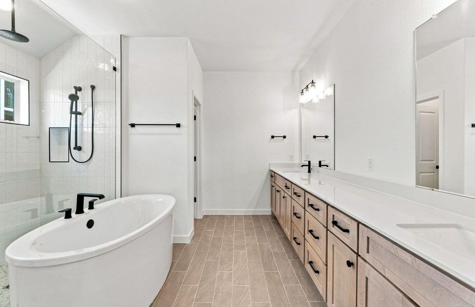 Furnished interior view inside a new home in West Cypress Hills, Spicewood (Image 12).