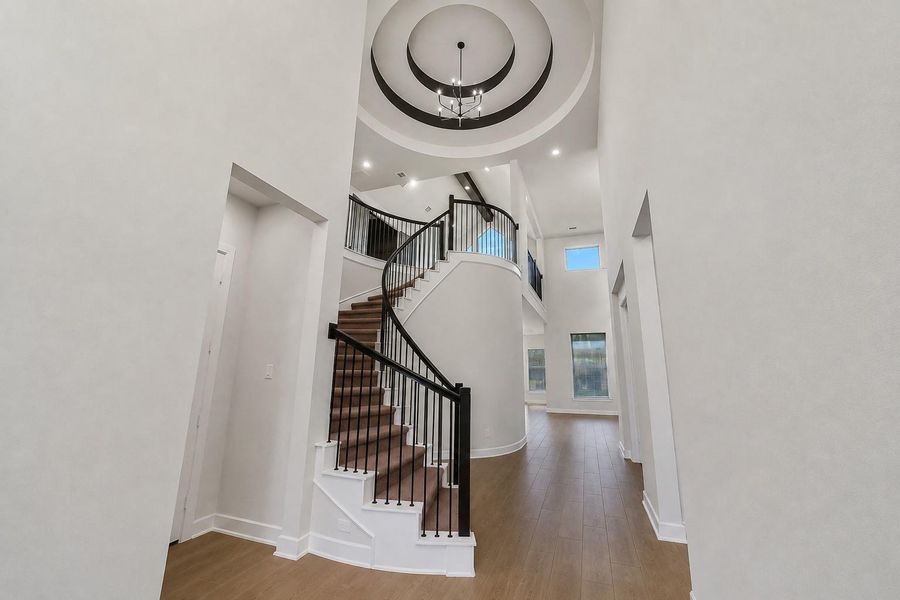 Furnished interior view inside a new home in Meridiana, Manvel (Image 6).