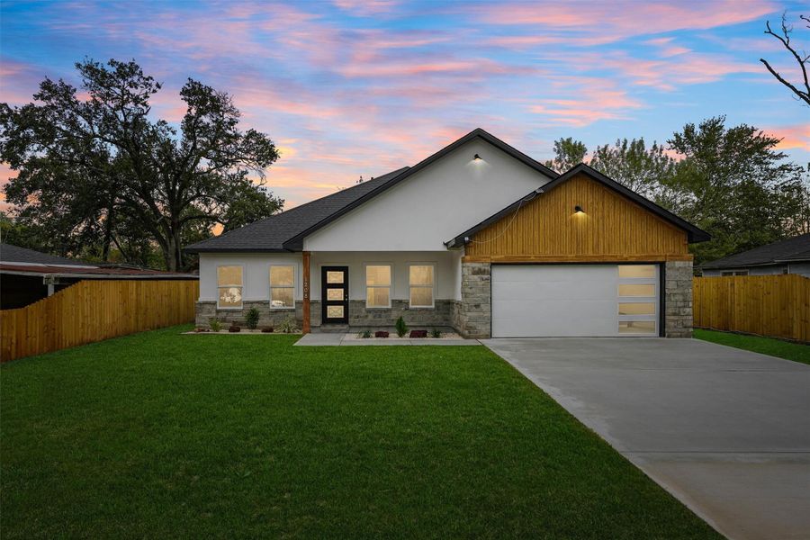 Front exterior of a new home in , Pasadena, TX, highlighting curb appeal (Image 15).