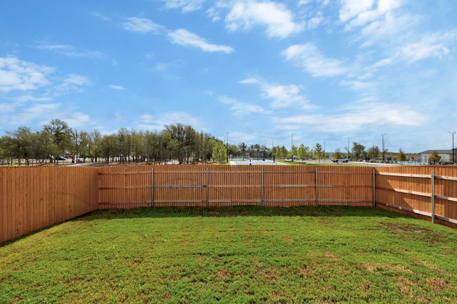 Exterior details and patio area of a home in Trinity Ranch, Elgin (Image 23).