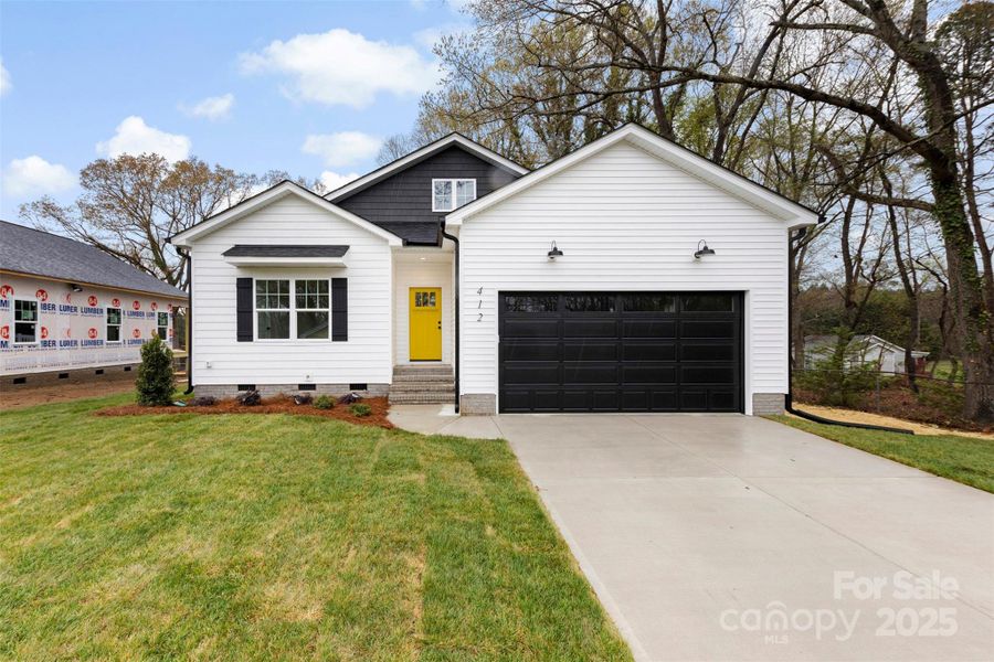 Front exterior of a new home in , Gastonia, NC, highlighting curb appeal (Image 1).
