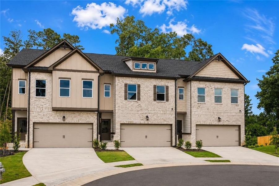 Front exterior of a new home in , Norcross, GA, highlighting curb appeal (Image 1). Front exterior of a new home in , Norcross, GA, highlighting curb appeal (Image 1).