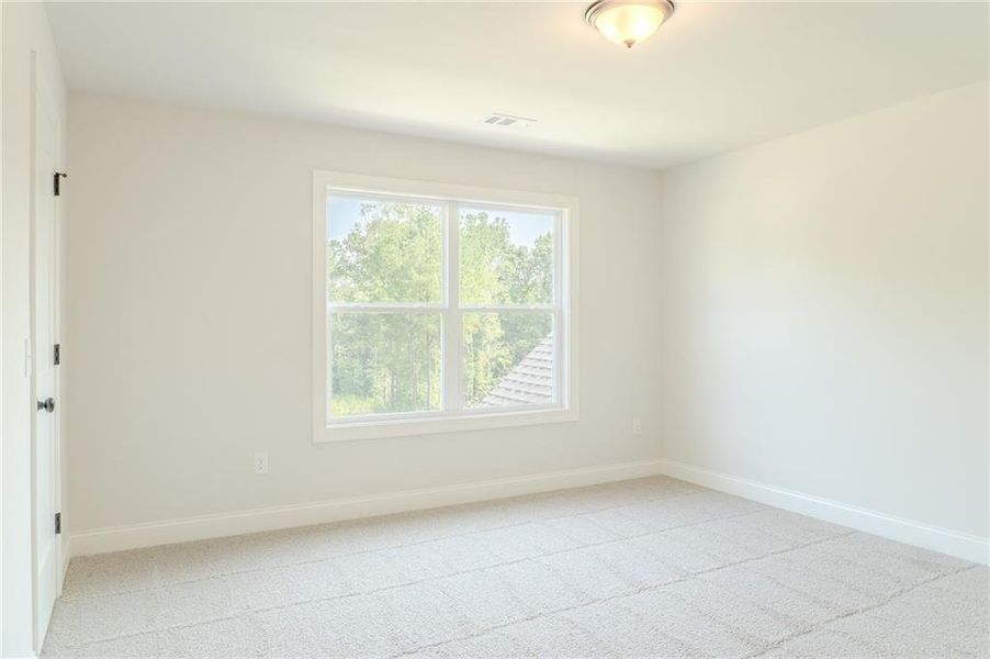 Spacious, unfurnished interior of a new home in Woodland Hills, Loganville (Image 14).