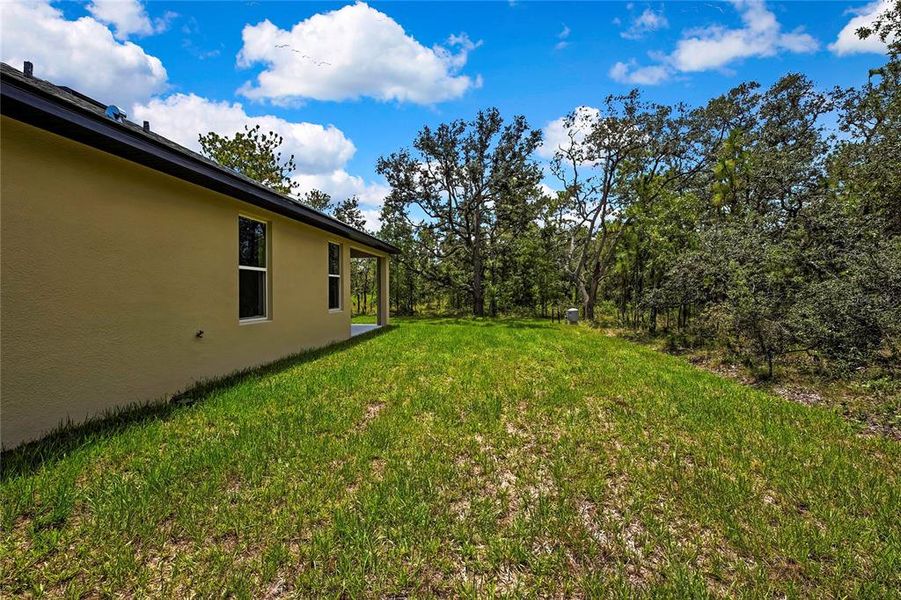 Front exterior of a new home in , Brooksville, FL, highlighting curb appeal (Image 29).
