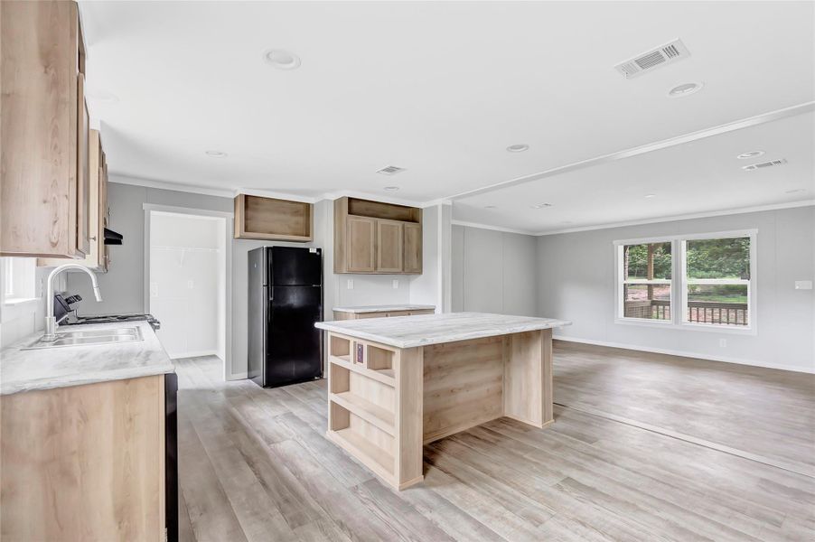 Kitchen with island and matching appliances new as of 2024