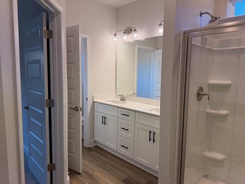 Furnished interior view inside a new home in Magnolia Villas, Cornelia (Image 6).