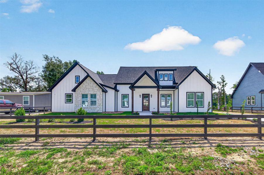 Front exterior of a new home in , Splendora, TX, highlighting curb appeal (Image 25).