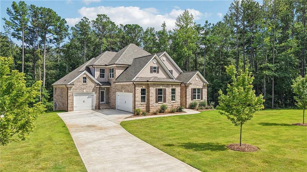 Front exterior of a new home in , Douglasville, GA, highlighting curb appeal (Image 15).