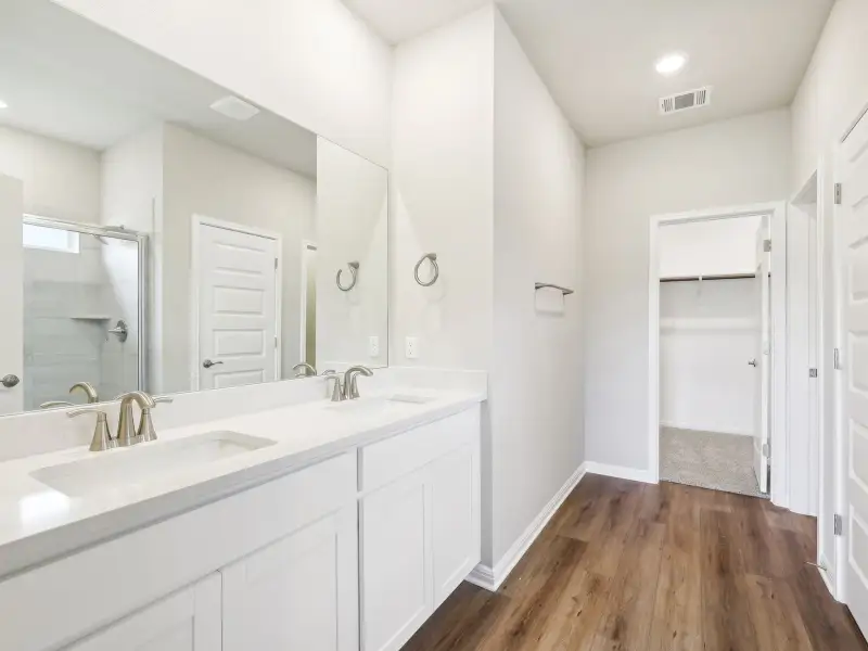 Furnished interior view inside a new home in Big Sky Ranch - Reserve Collection, Dripping Springs (Image 4).