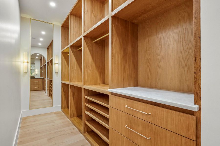 View of primary closet (HIS). View of primary closet (HIS).