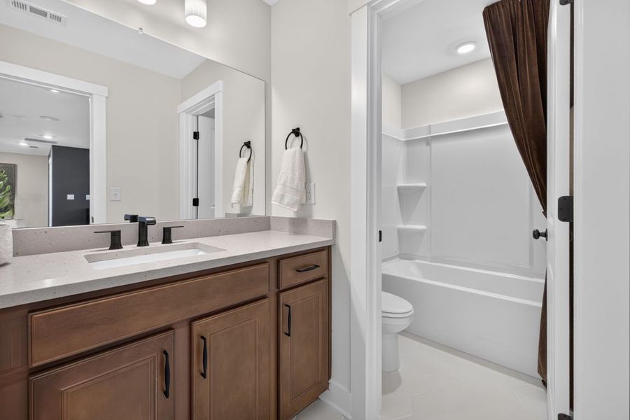 Representative furnished interior of a home built from the Wynfield by Pulte Homes in Amherst, McDonough (Image 14).